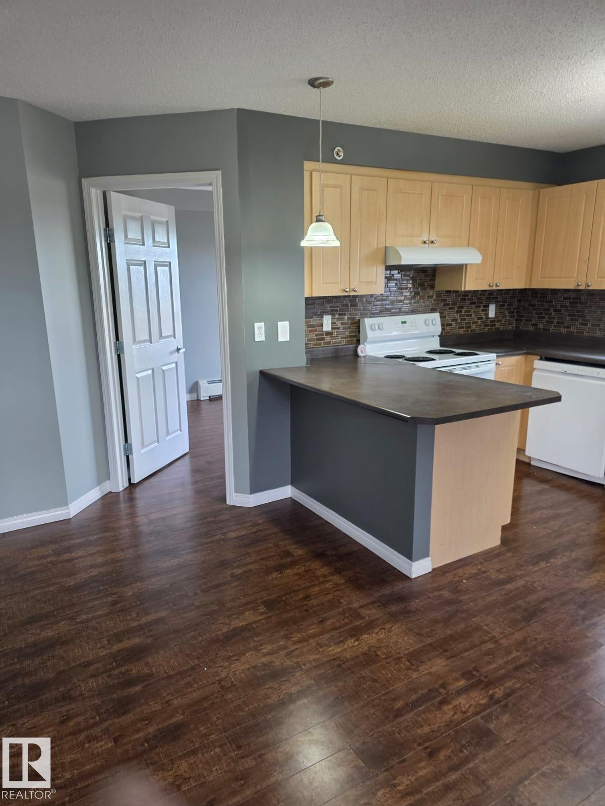 Photo 2 at 402 - 622 Mcallister Loop SW, Macewan, Edmonton