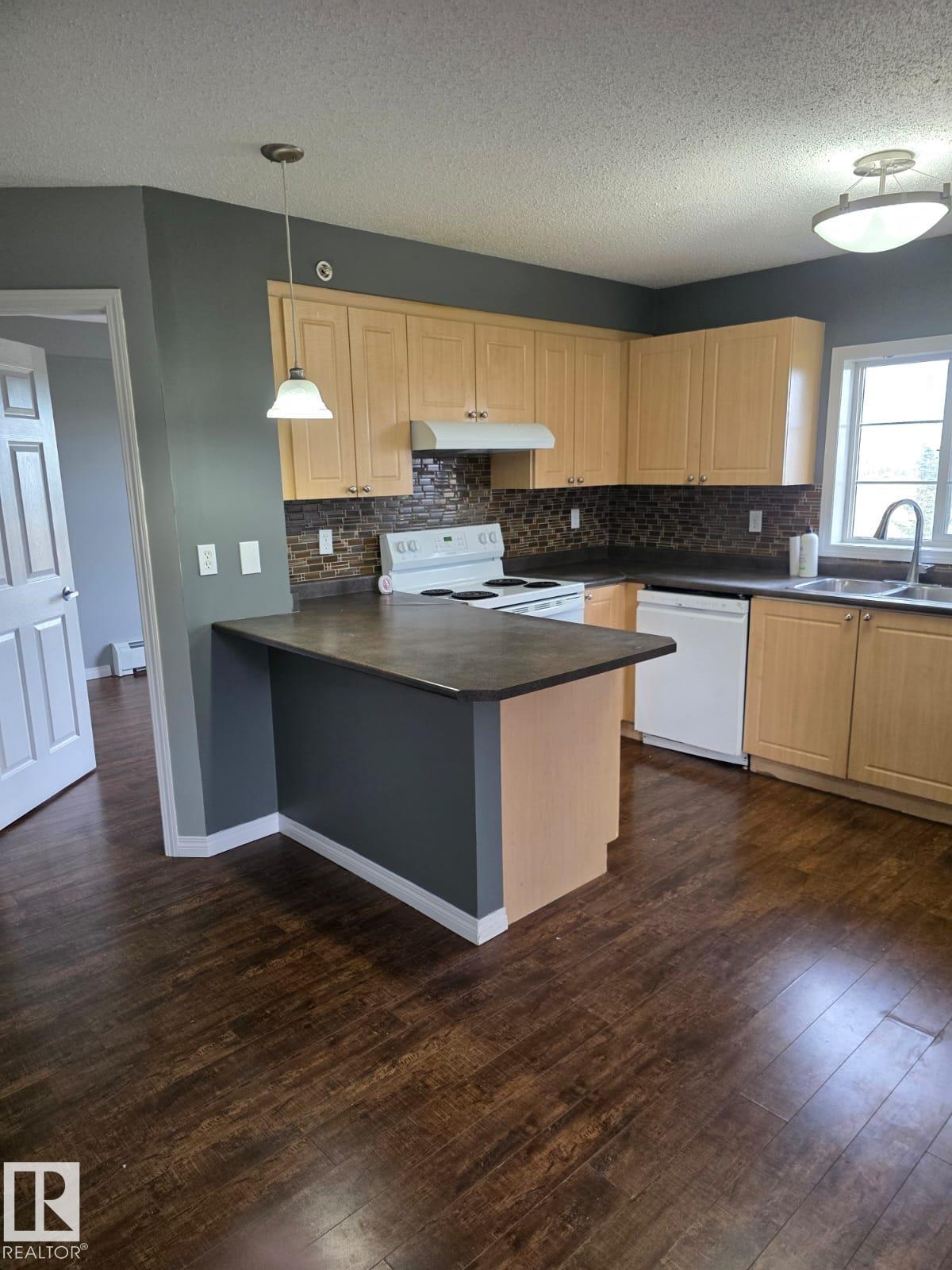 Photo 3 at 402 - 622 Mcallister Loop SW, Macewan, Edmonton