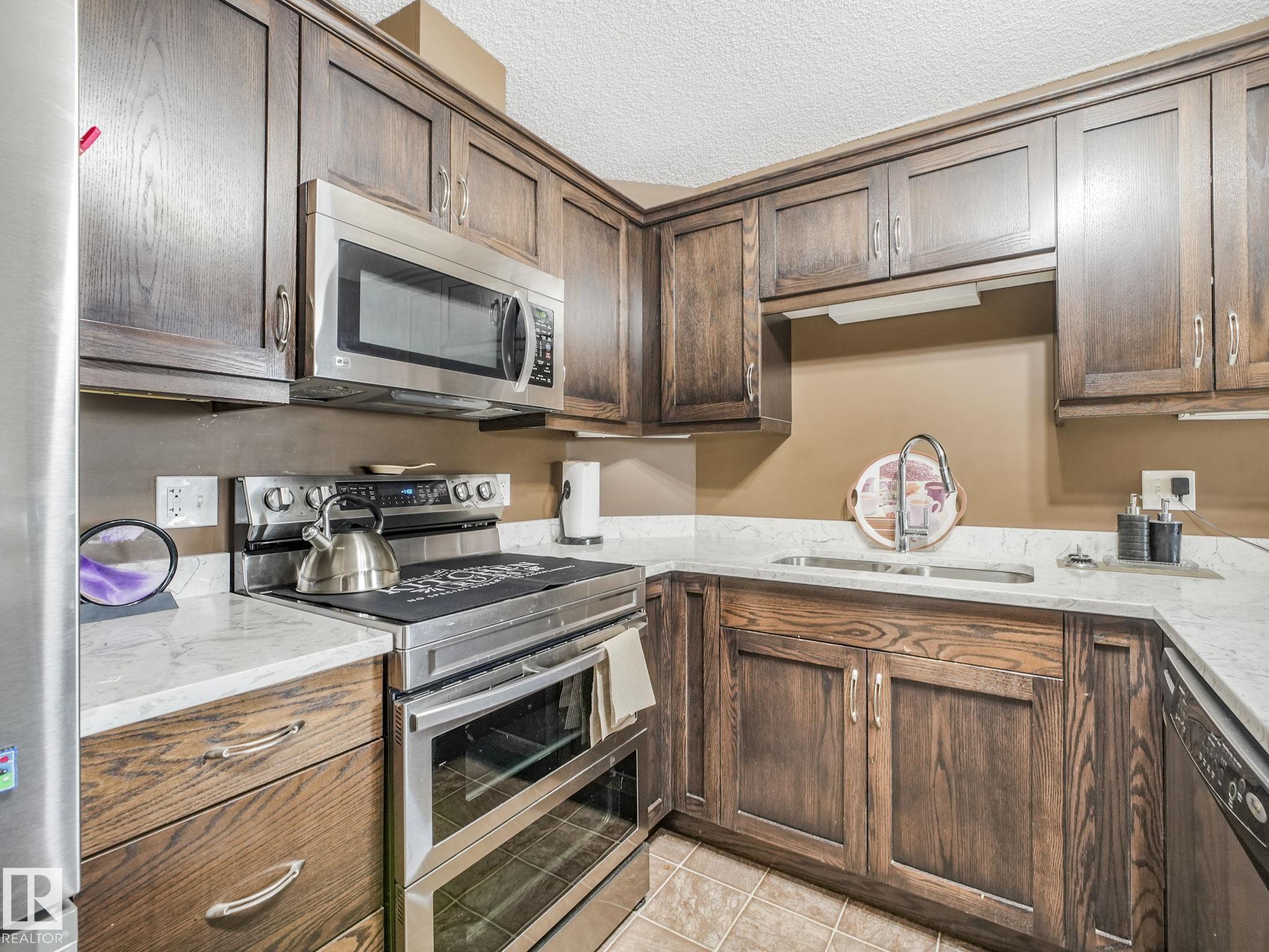 Photo 11 at 435 - 1520 Hammond Gate NW, The Hamptons, Edmonton