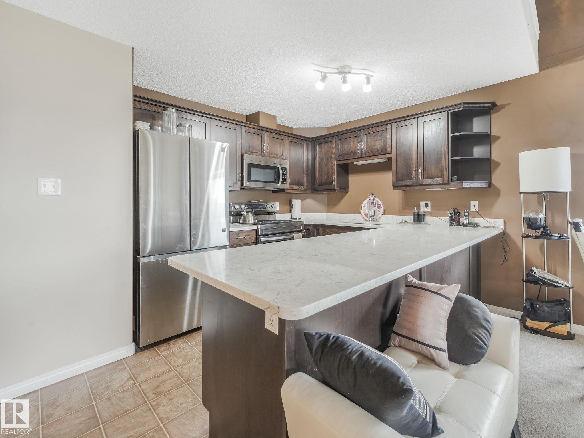 Photo 12 at 435 - 1520 Hammond Gate NW, The Hamptons, Edmonton