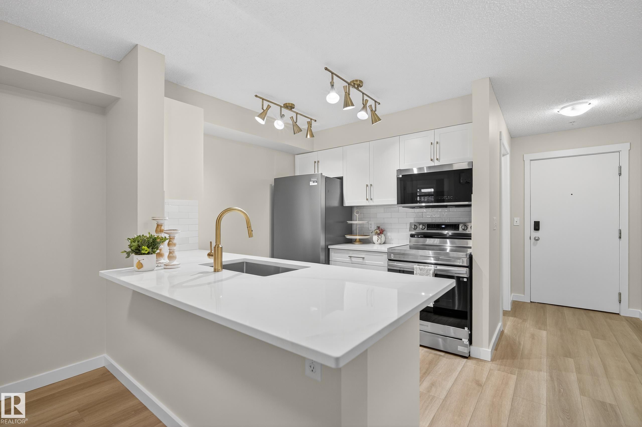 Photo 8 at 109 - 5804 Mullen Place NW, MacTaggart, Edmonton