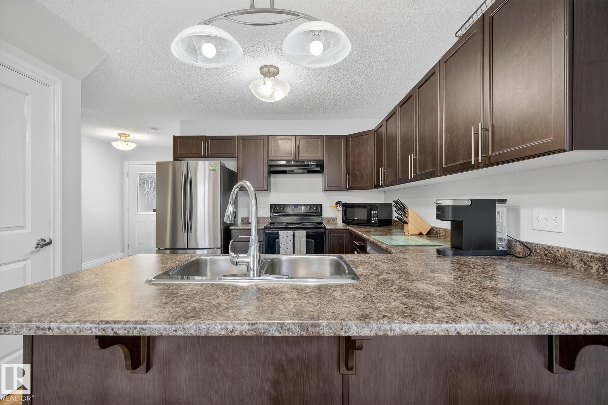 Photo 5 at 1 - 2005 70 Street SW, Summerside, Edmonton