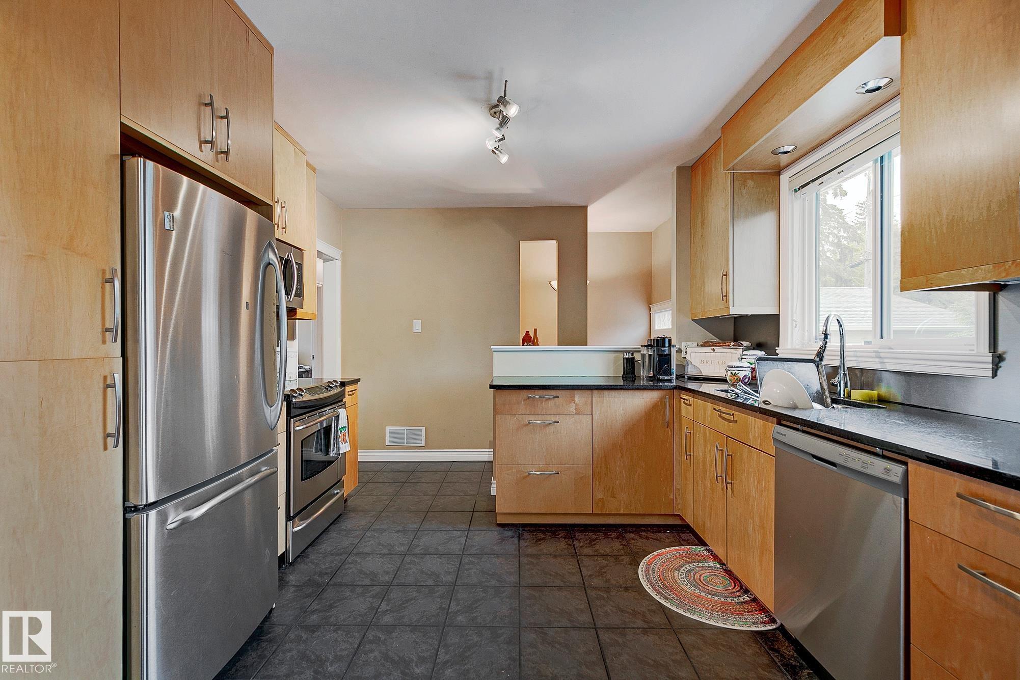 Photo 13 at 13919 102 Avenue NW, Glenora, Edmonton