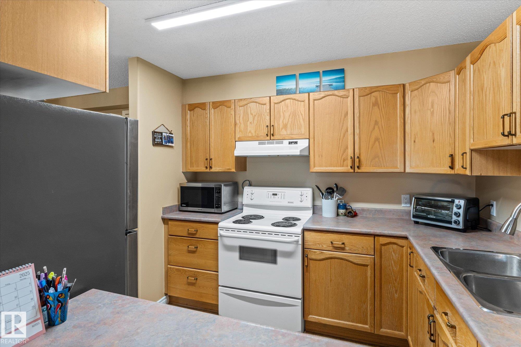 Photo 14 at 203 - 160 Kingswood Boulevard, Kingswood, St. Albert