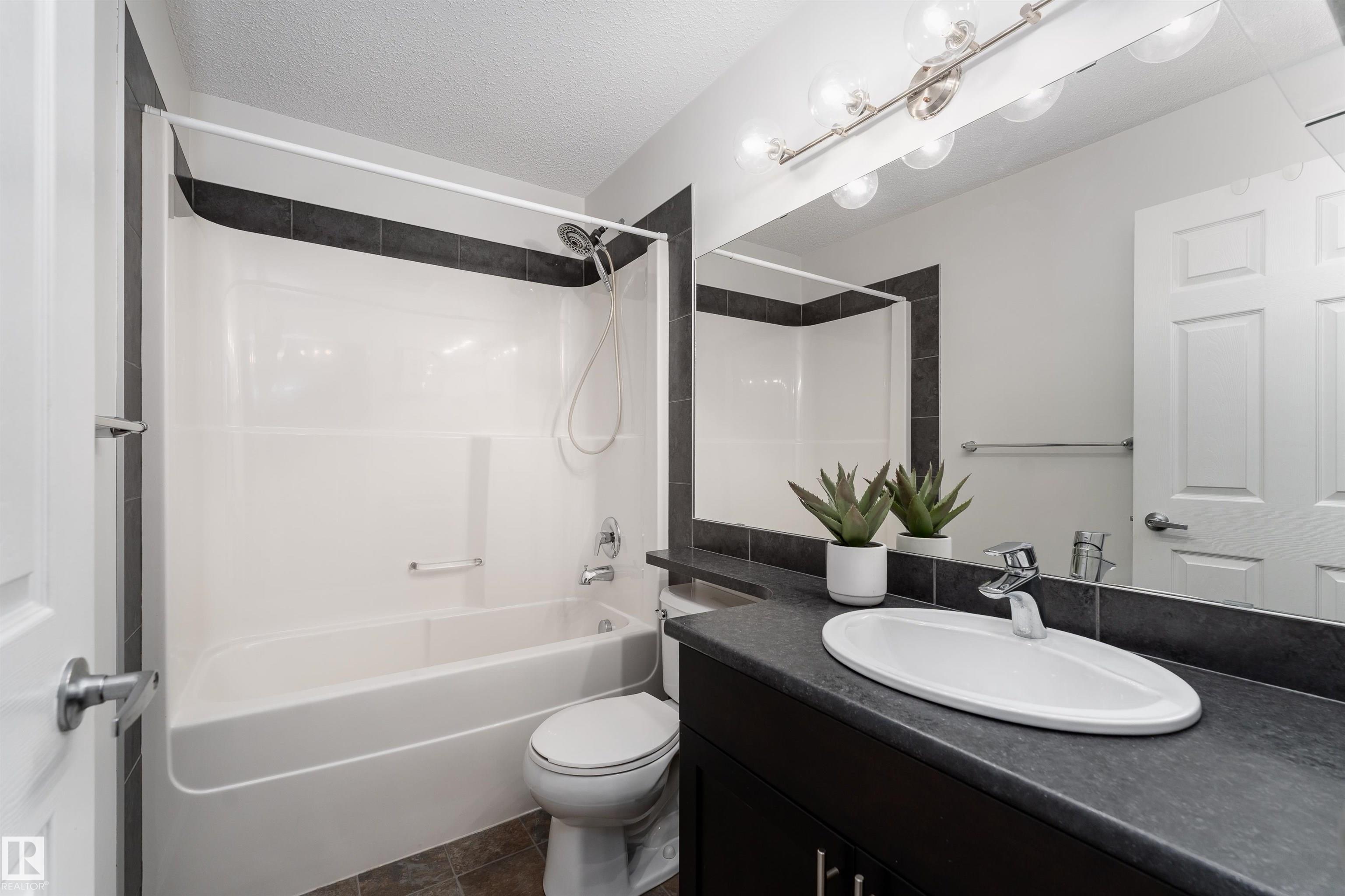 Photo 13 at 22 - 6520 2 Avenue SW, Charlesworth, Edmonton