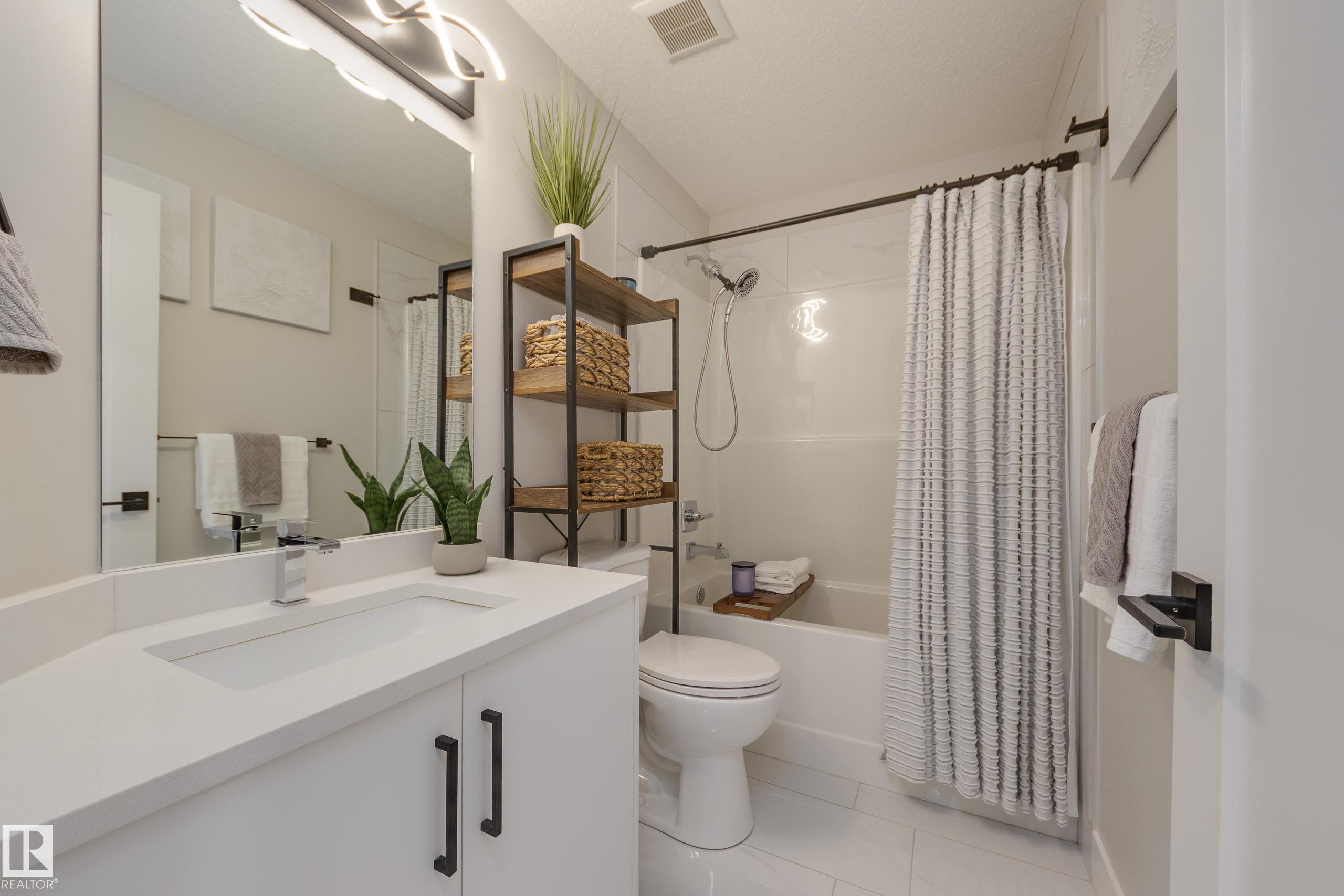 Photo 38 at 205 Caledonia Drive, Meadowview Park, Leduc