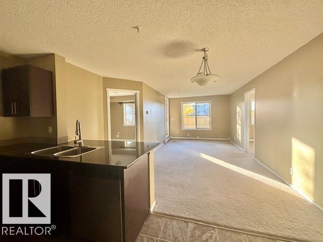 Photo 4 at 113 - 3315 James Mowatt Trail SW, Allard, Edmonton