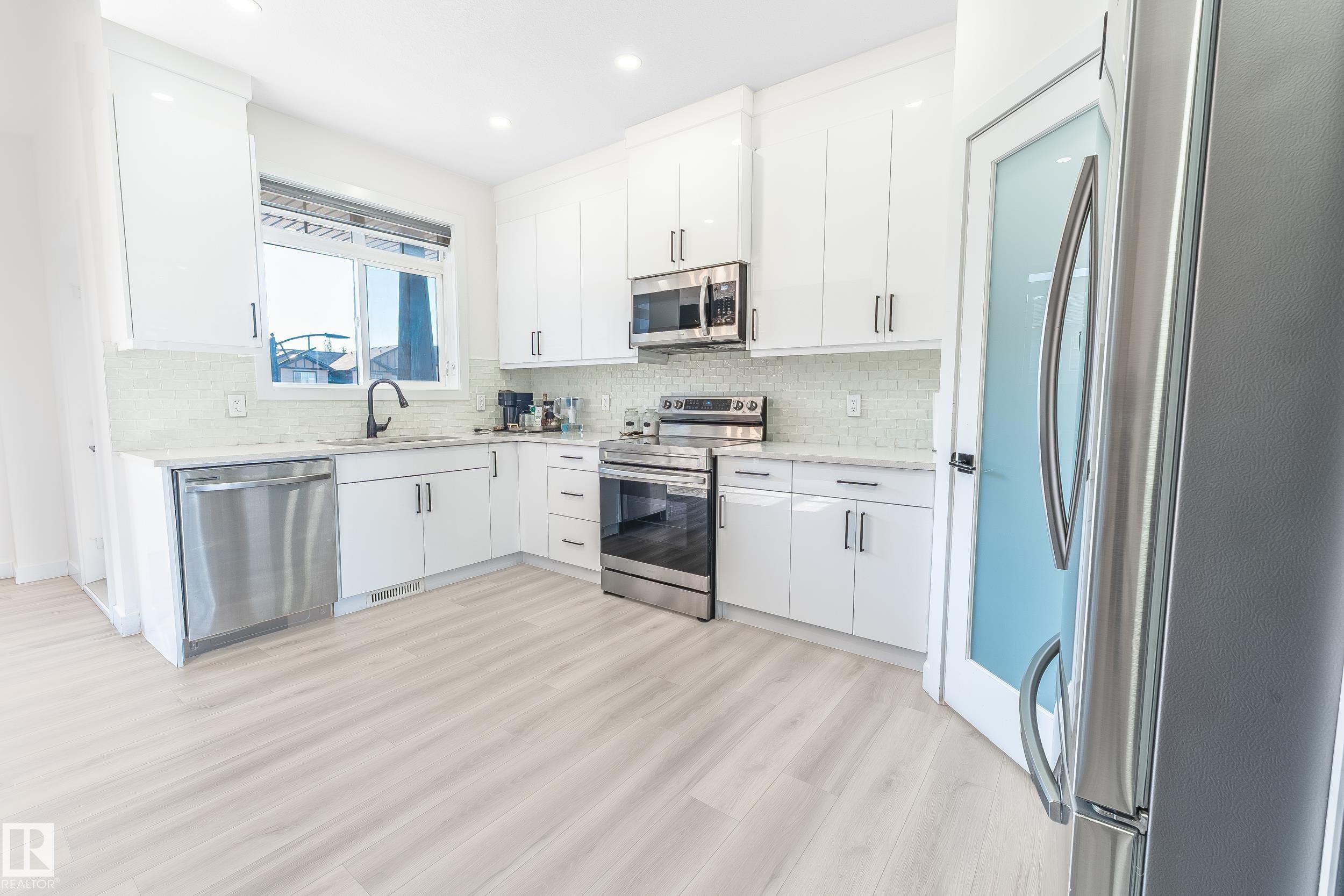 Photo 12 at 19 - 1703 16 Avenue NW, Laurel, Edmonton