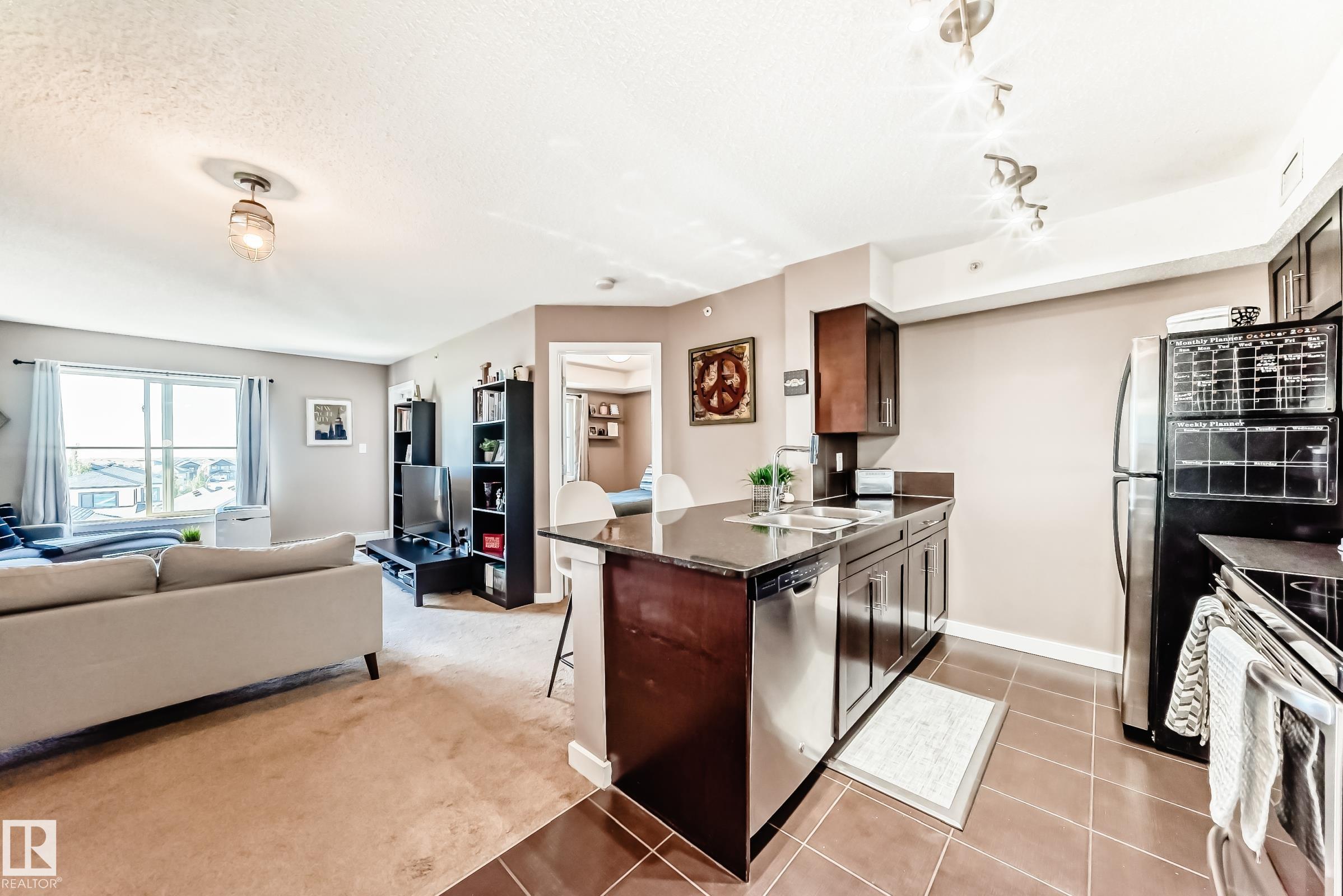 Photo 6 at 406 - 1060 Mcconachie Boulevard NW, McConachie Area, Edmonton