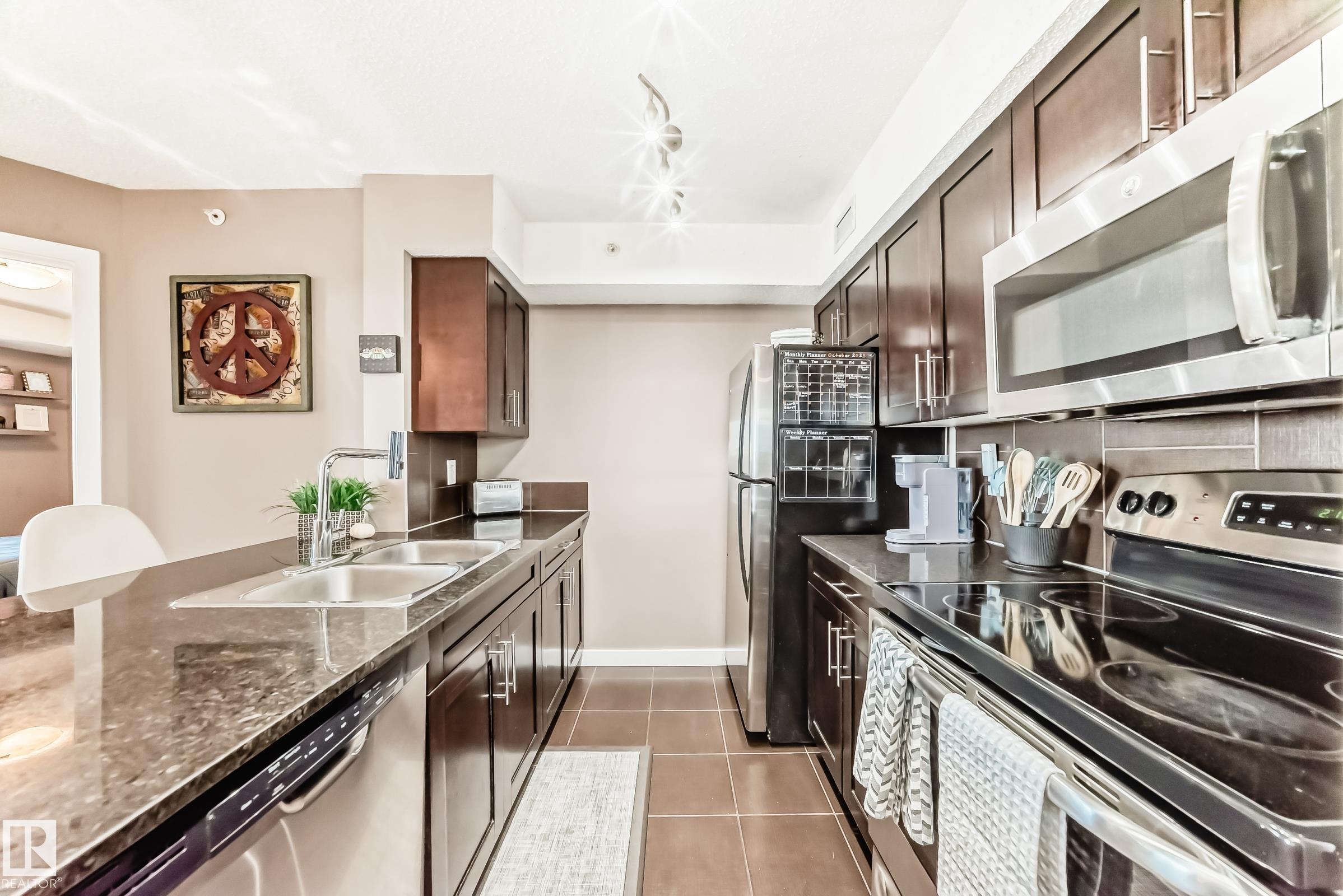 Photo 7 at 406 - 1060 Mcconachie Boulevard NW, McConachie Area, Edmonton
