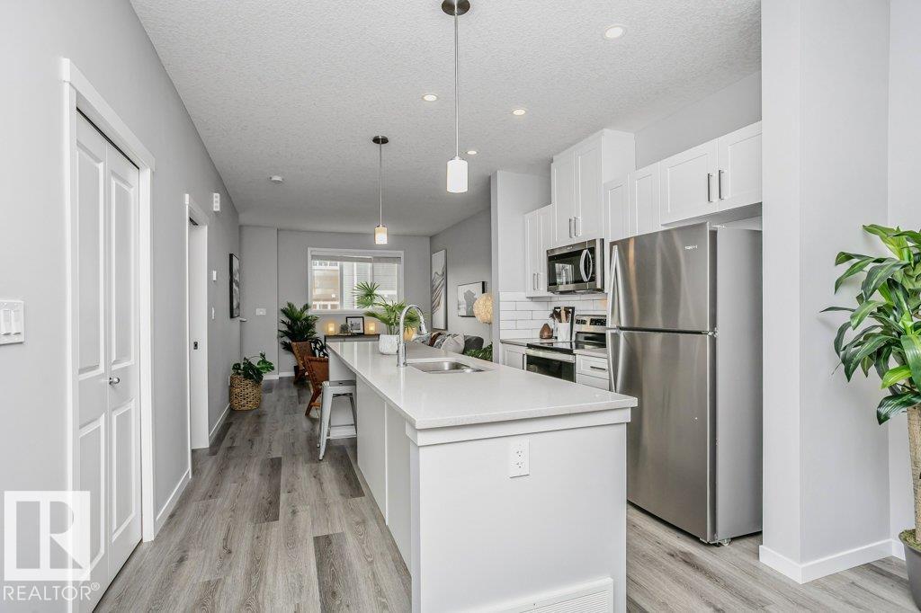 Photo 11 at 52 - 320 Secord Boulevard NW, Secord, Edmonton