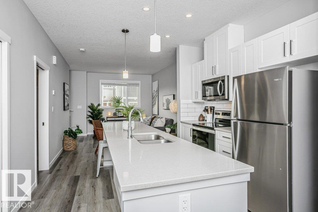 Photo 12 at 52 - 320 Secord Boulevard NW, Secord, Edmonton