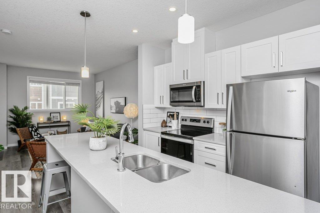 Photo 13 at 52 - 320 Secord Boulevard NW, Secord, Edmonton