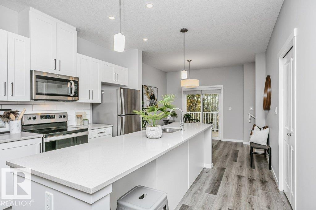Photo 16 at 52 - 320 Secord Boulevard NW, Secord, Edmonton