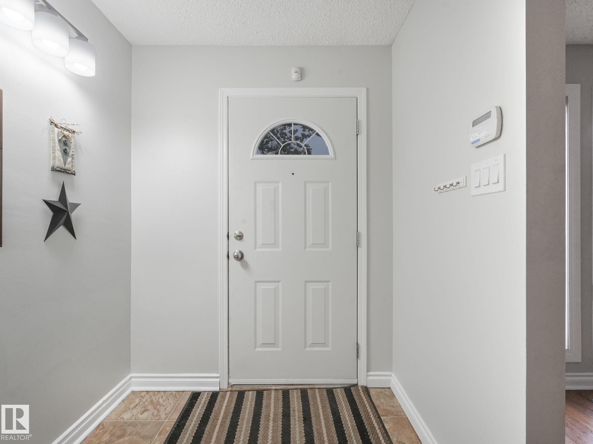 Photo 2 at 7351 180 Street NW, Lymburn, Edmonton