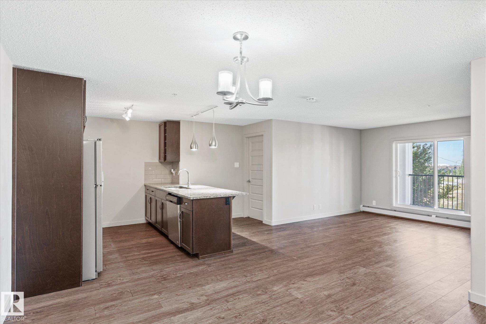 Photo 17 at 316 - 4008 Savaryn Drive SW, Summerside, Edmonton