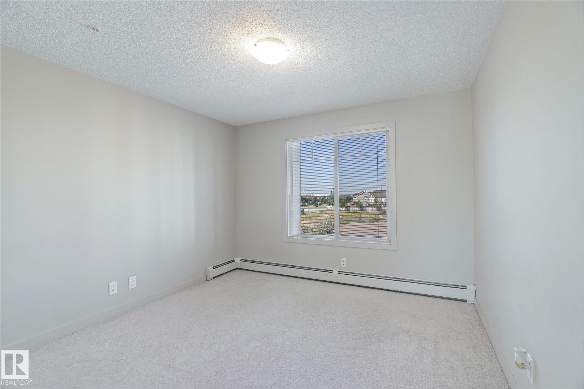 Photo 29 at 316 - 4008 Savaryn Drive SW, Summerside, Edmonton