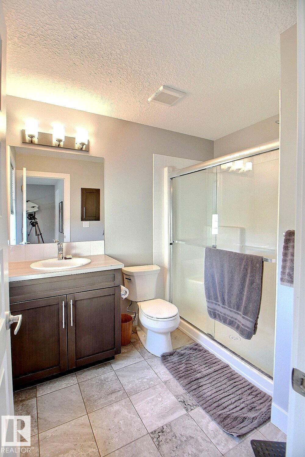 Photo 11 at 13016 205 Street NW, Trumpeter Area, Edmonton