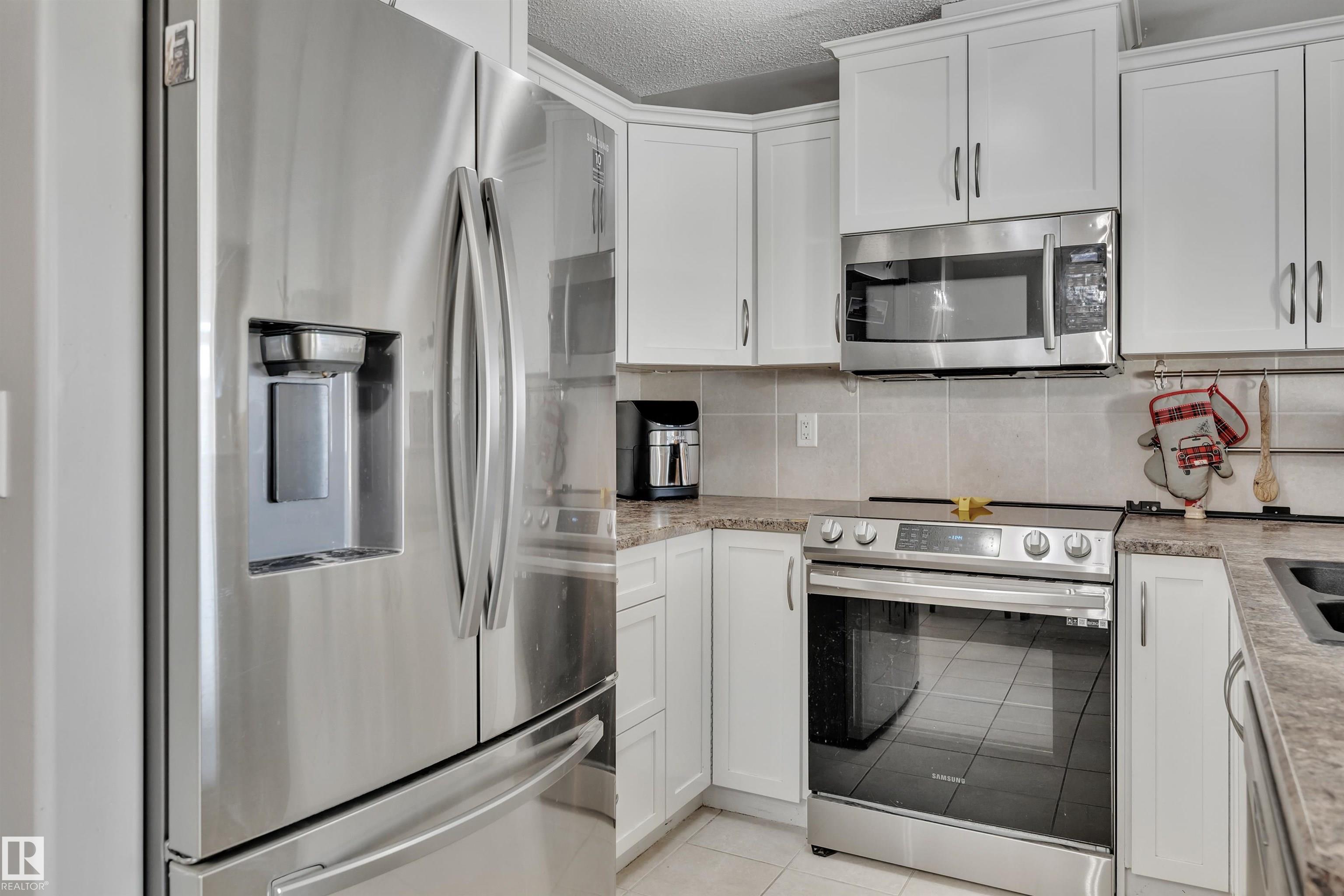 Photo 14 at 33 - 9511 102, Morinville