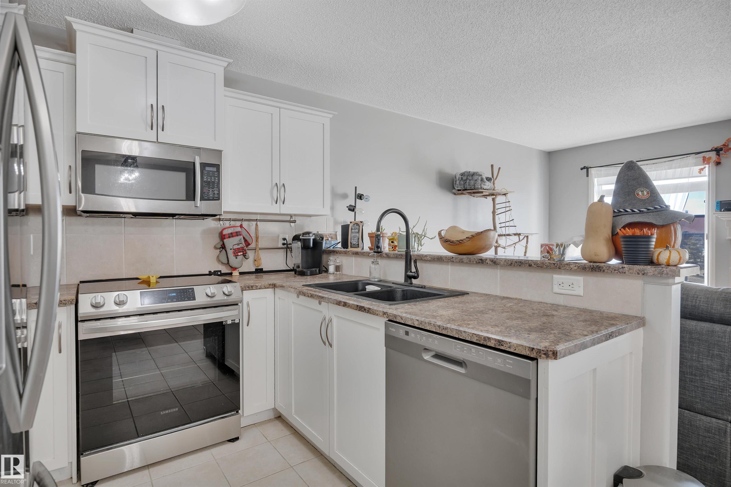 Photo 15 at 33 - 9511 102, Morinville