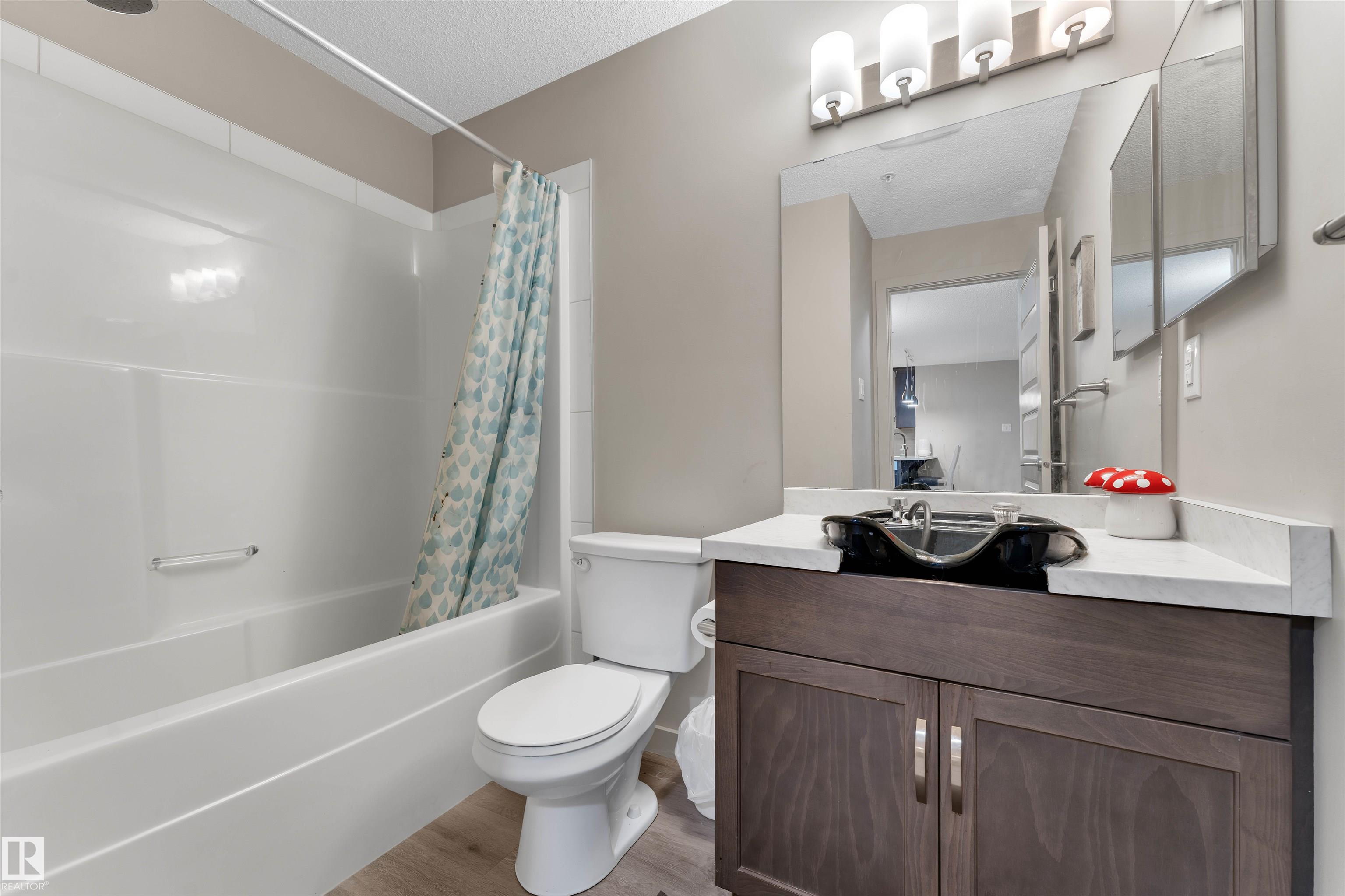 Photo 23 at 106 - 4008 Savaryn Drive SW, Summerside, Edmonton
