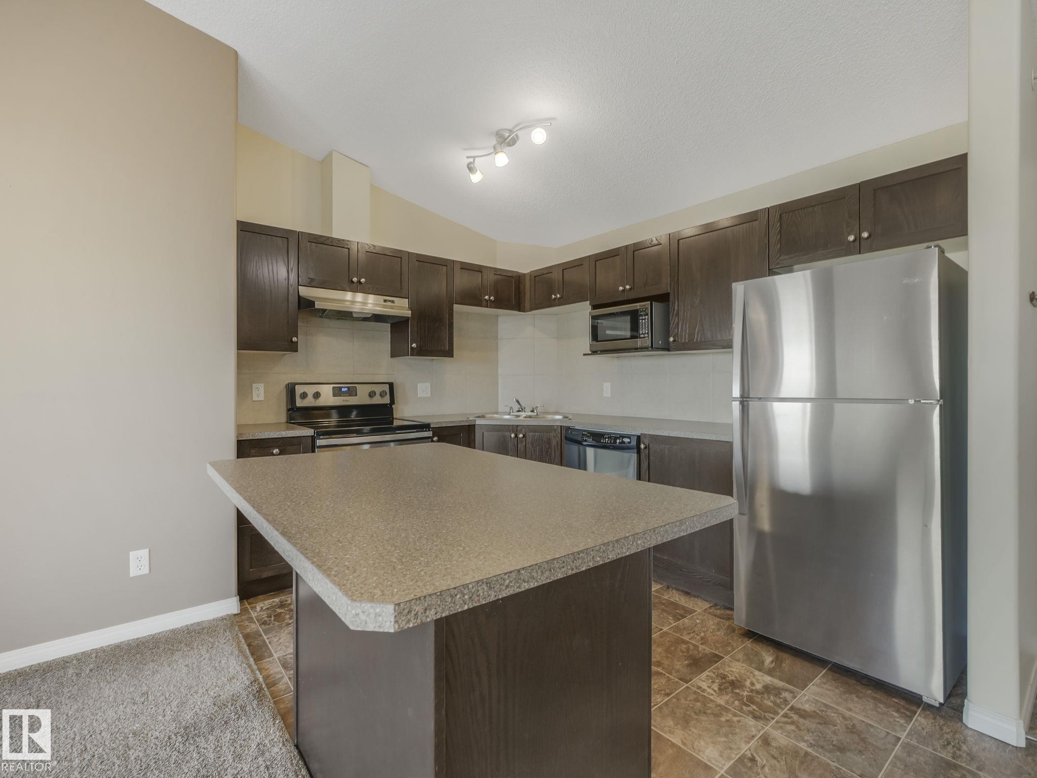 Photo 7 at 423 - 1520 Hammond Gate NW, The Hamptons, Edmonton