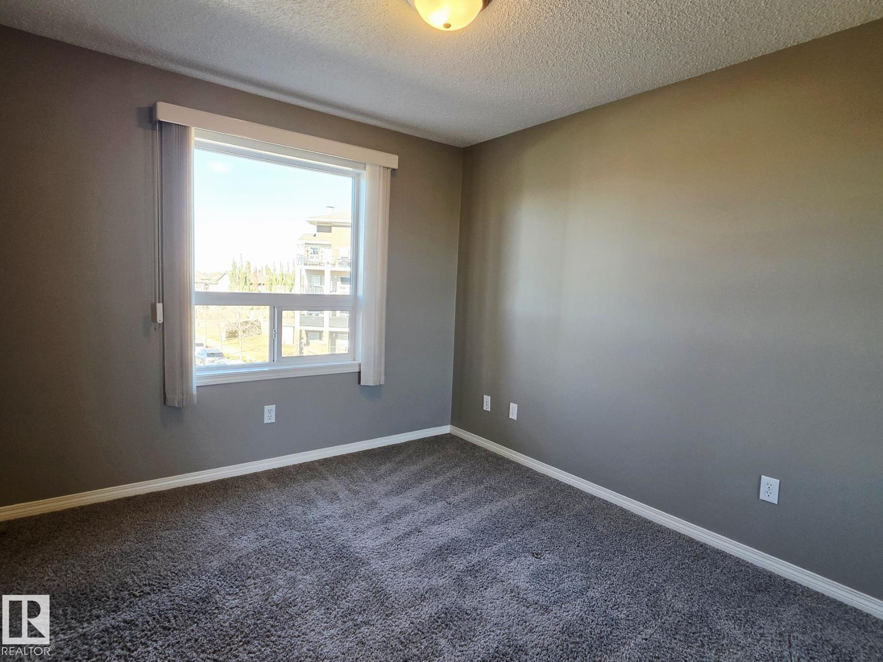 Photo 23 at 340 - 1520 Hammond Gate NW, The Hamptons, Edmonton