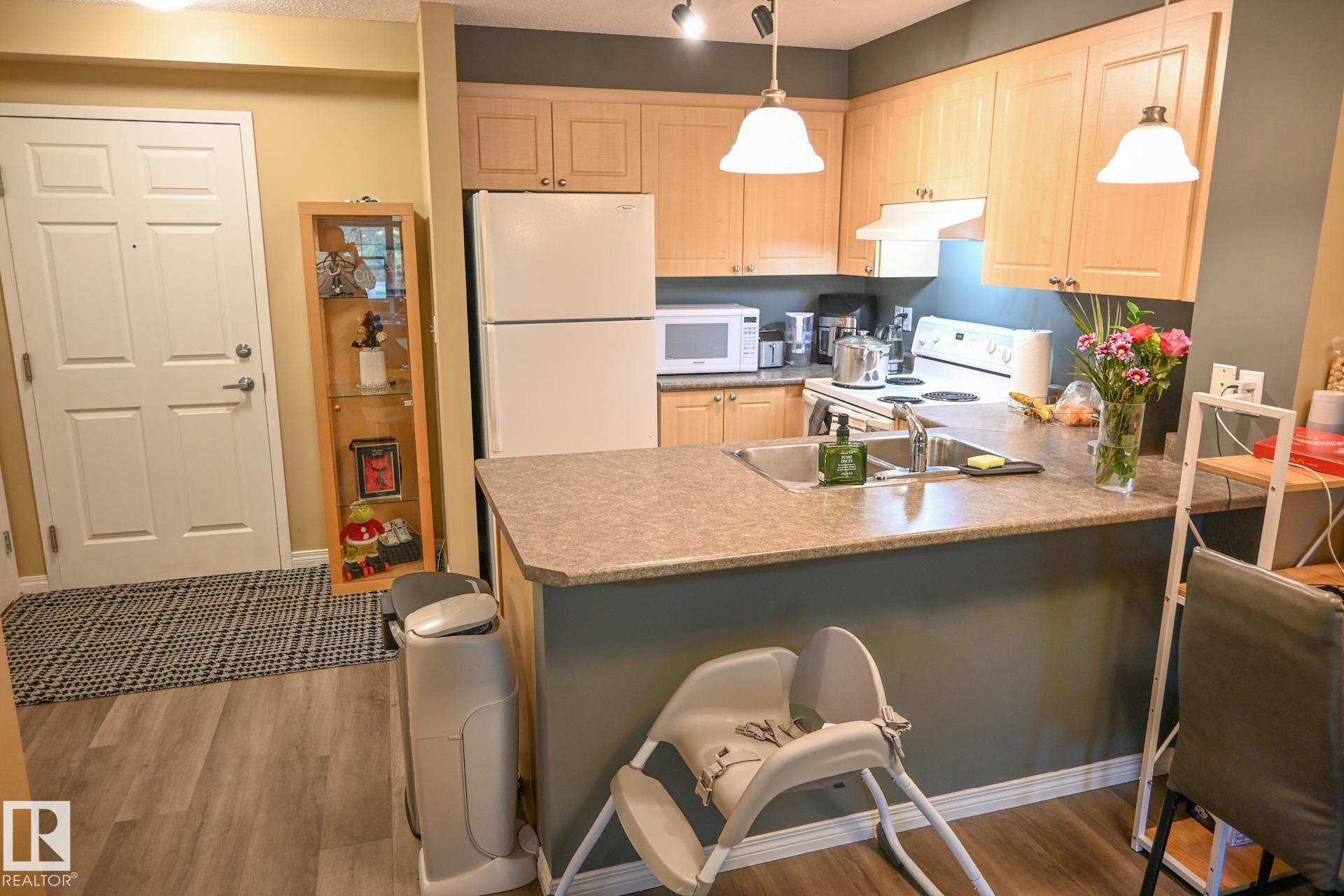 Photo 3 at 113 - 630 Mcallister Loop SW, Macewan, Edmonton