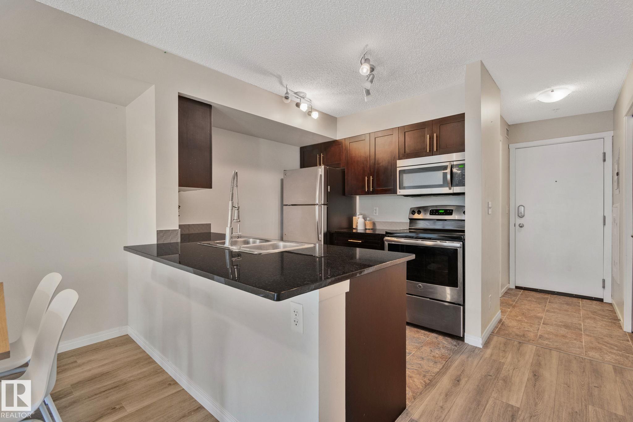 Photo 3 at 210 - 5804 Mullen Place NW, MacTaggart, Edmonton