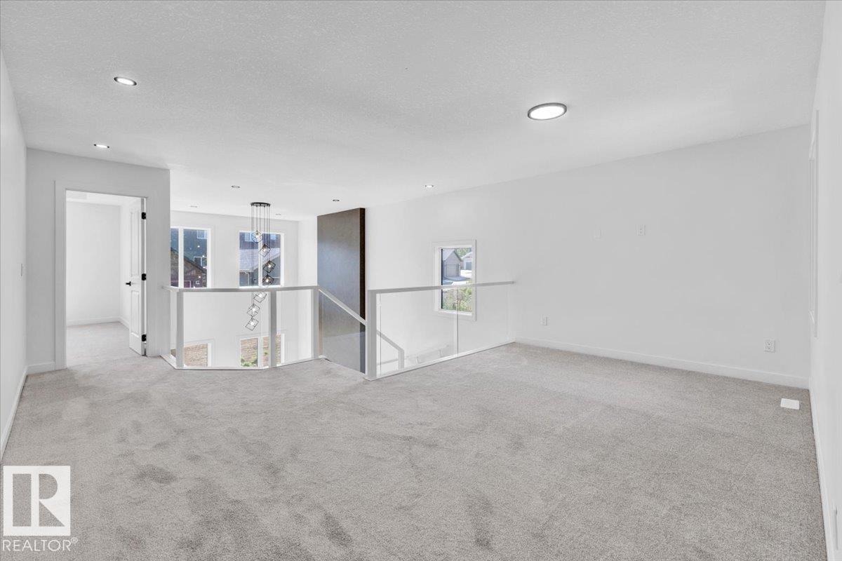 Photo 26 at 1119 Gyrfalcon Crescent NW, Hawks Ridge, Edmonton