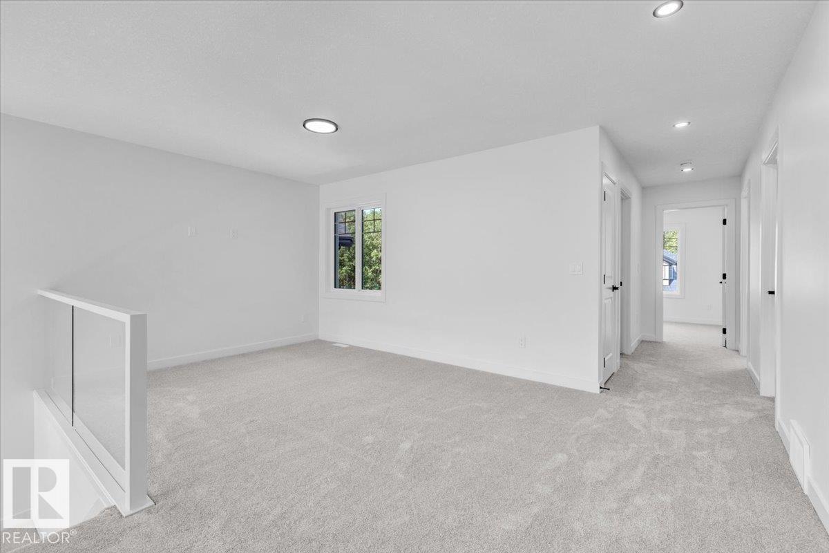 Photo 27 at 1119 Gyrfalcon Crescent NW, Hawks Ridge, Edmonton