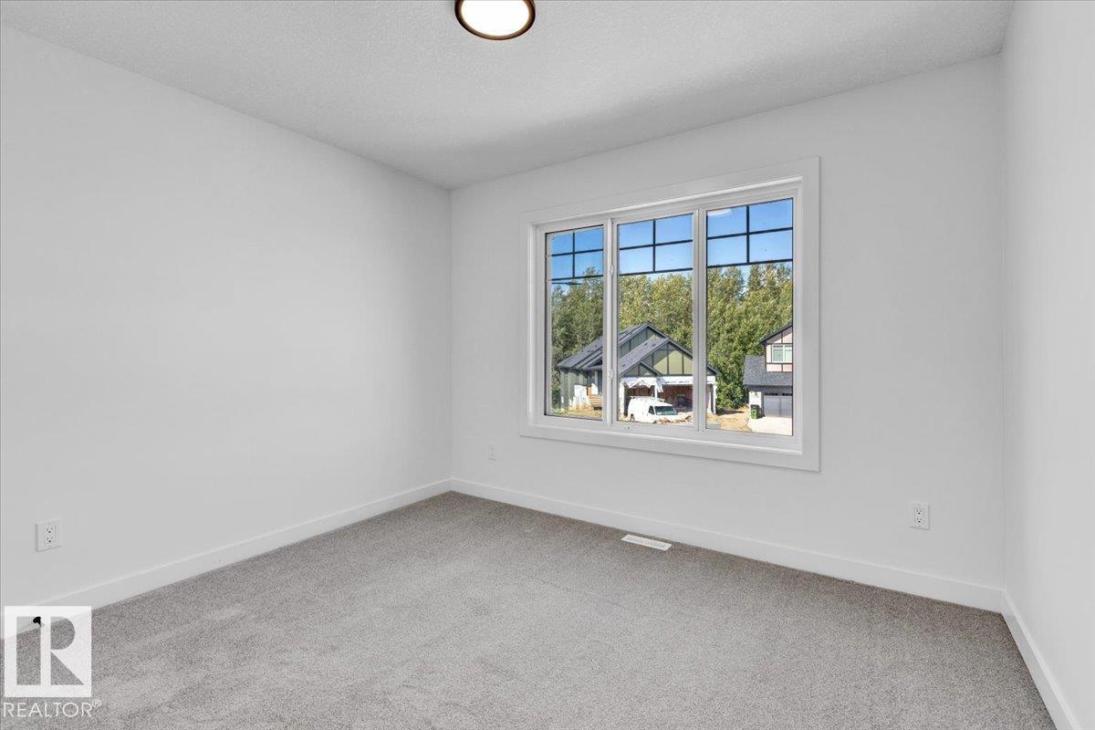 Photo 29 at 1119 Gyrfalcon Crescent NW, Hawks Ridge, Edmonton