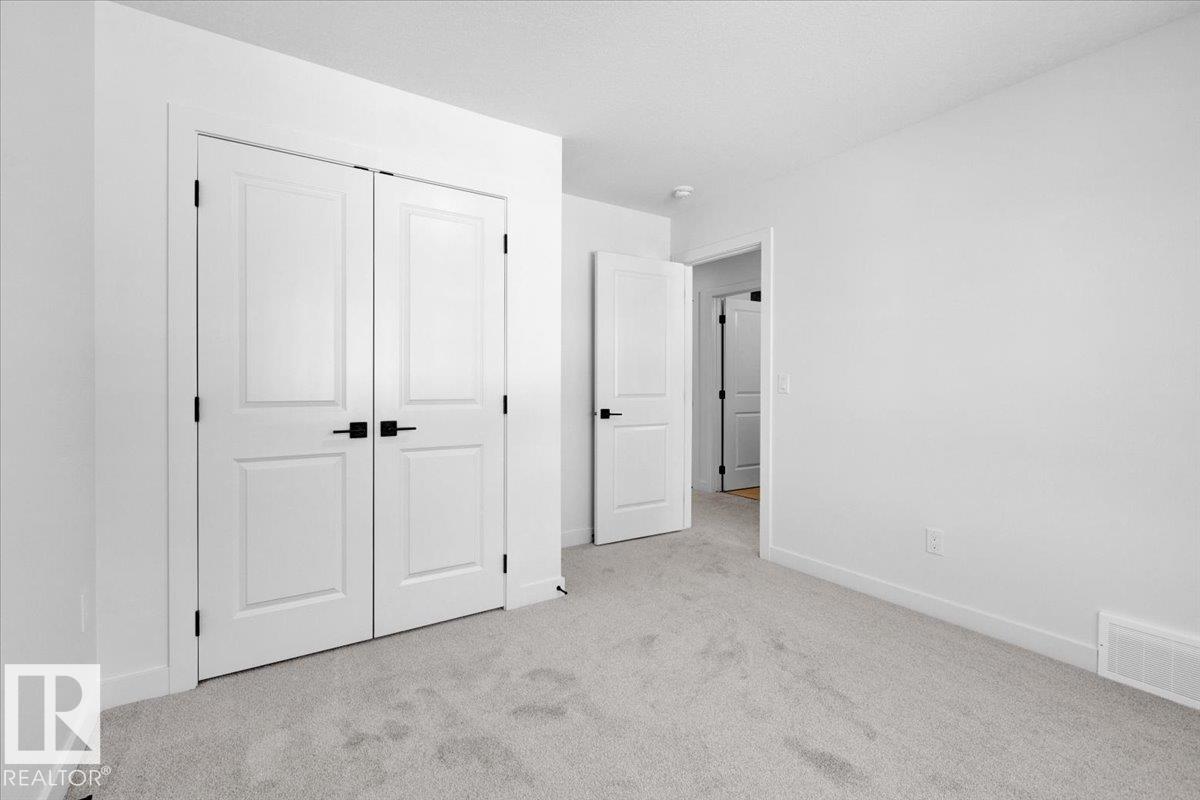 Photo 34 at 1119 Gyrfalcon Crescent NW, Hawks Ridge, Edmonton