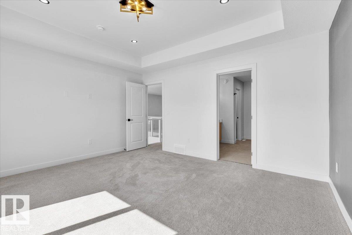 Photo 37 at 1119 Gyrfalcon Crescent NW, Hawks Ridge, Edmonton