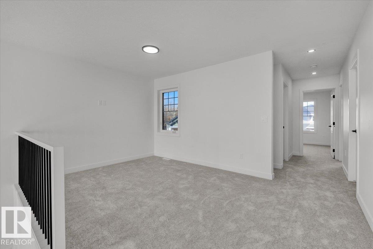 Photo 29 at 1115 Gyrfalcon Crescent NW, Hawks Ridge, Edmonton