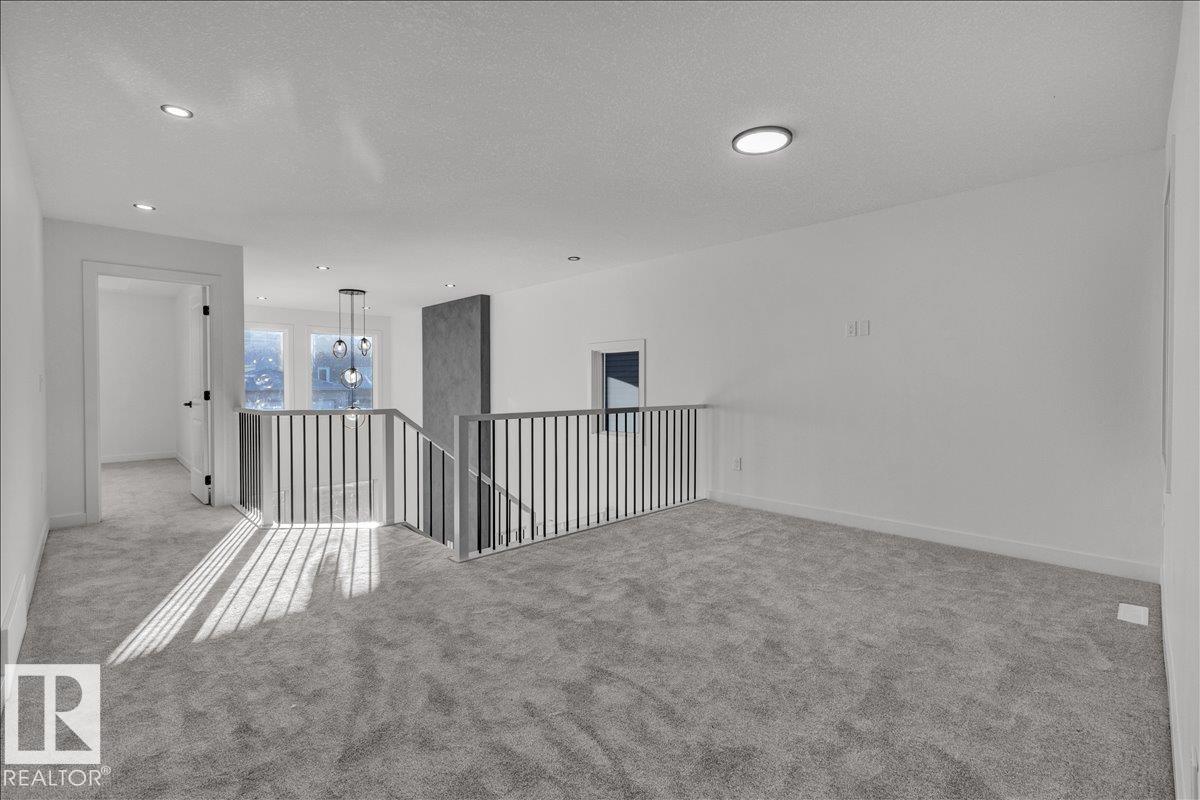Photo 31 at 1115 Gyrfalcon Crescent NW, Hawks Ridge, Edmonton