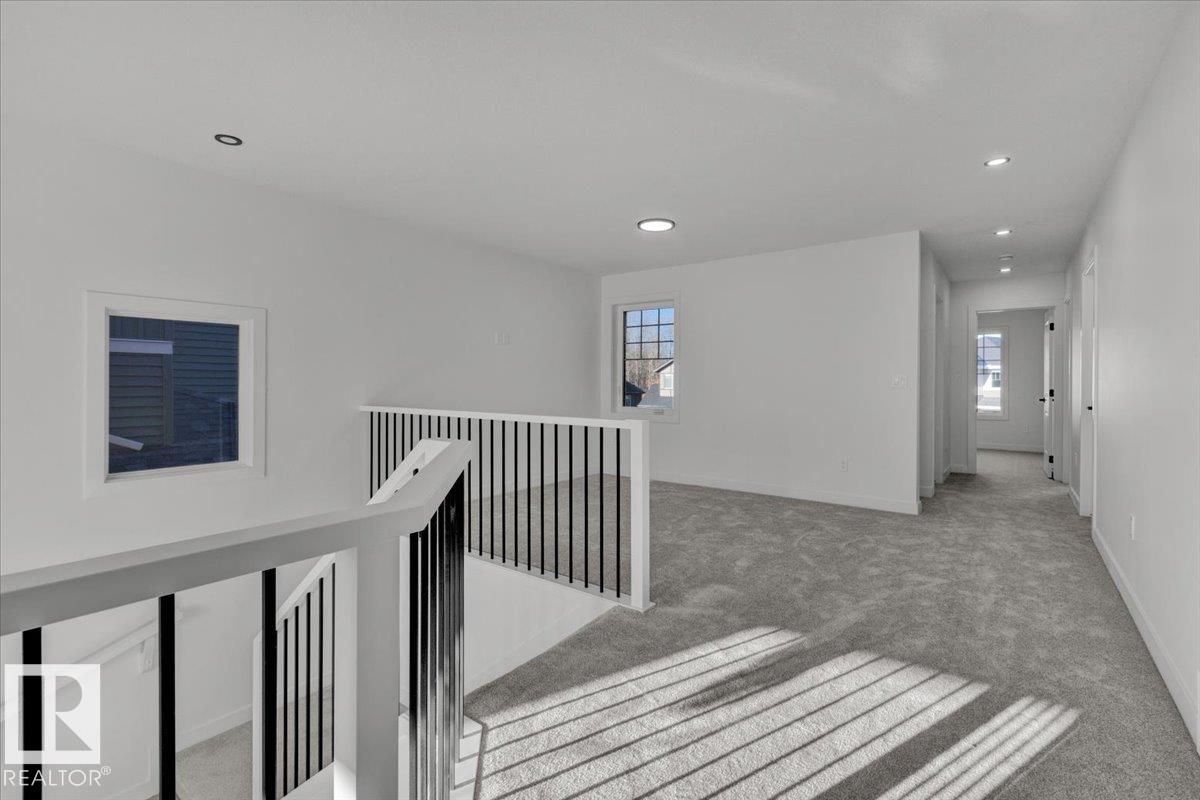 Photo 35 at 1115 Gyrfalcon Crescent NW, Hawks Ridge, Edmonton
