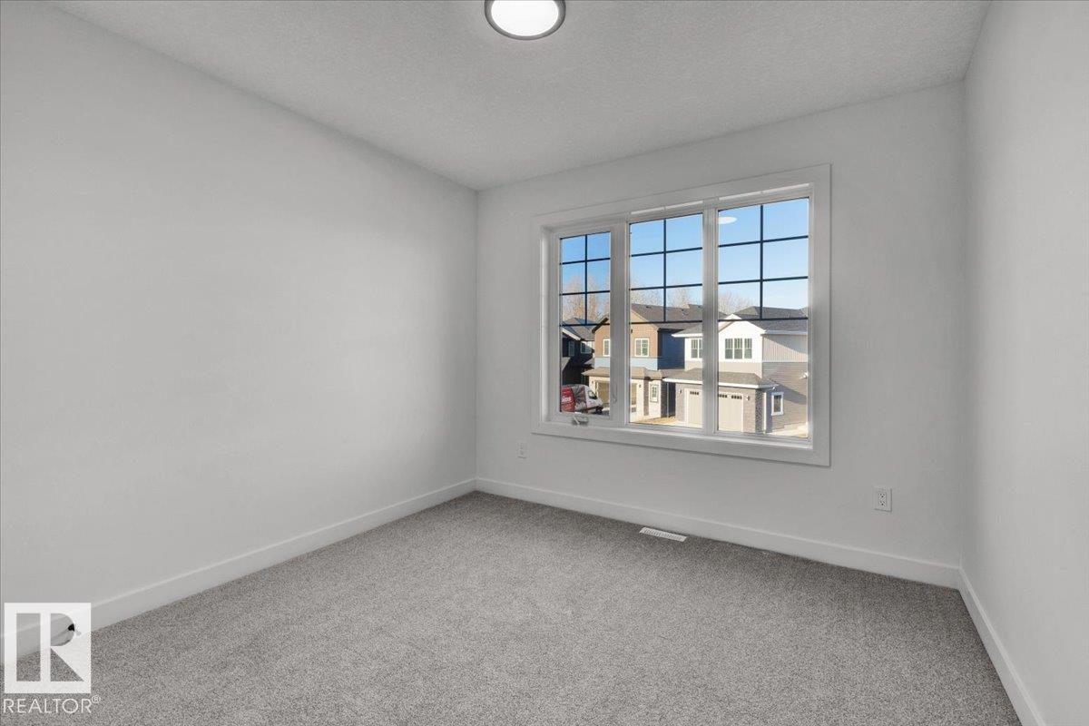 Photo 39 at 1115 Gyrfalcon Crescent NW, Hawks Ridge, Edmonton