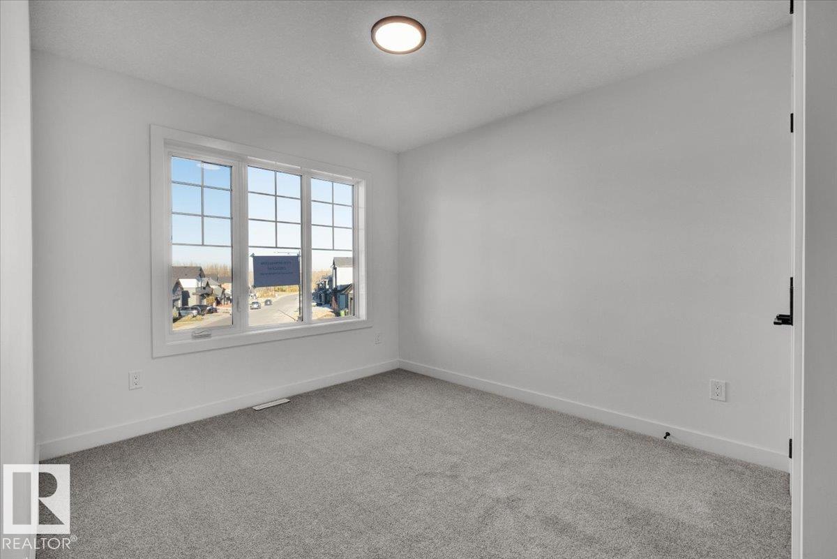 Photo 44 at 1115 Gyrfalcon Crescent NW, Hawks Ridge, Edmonton