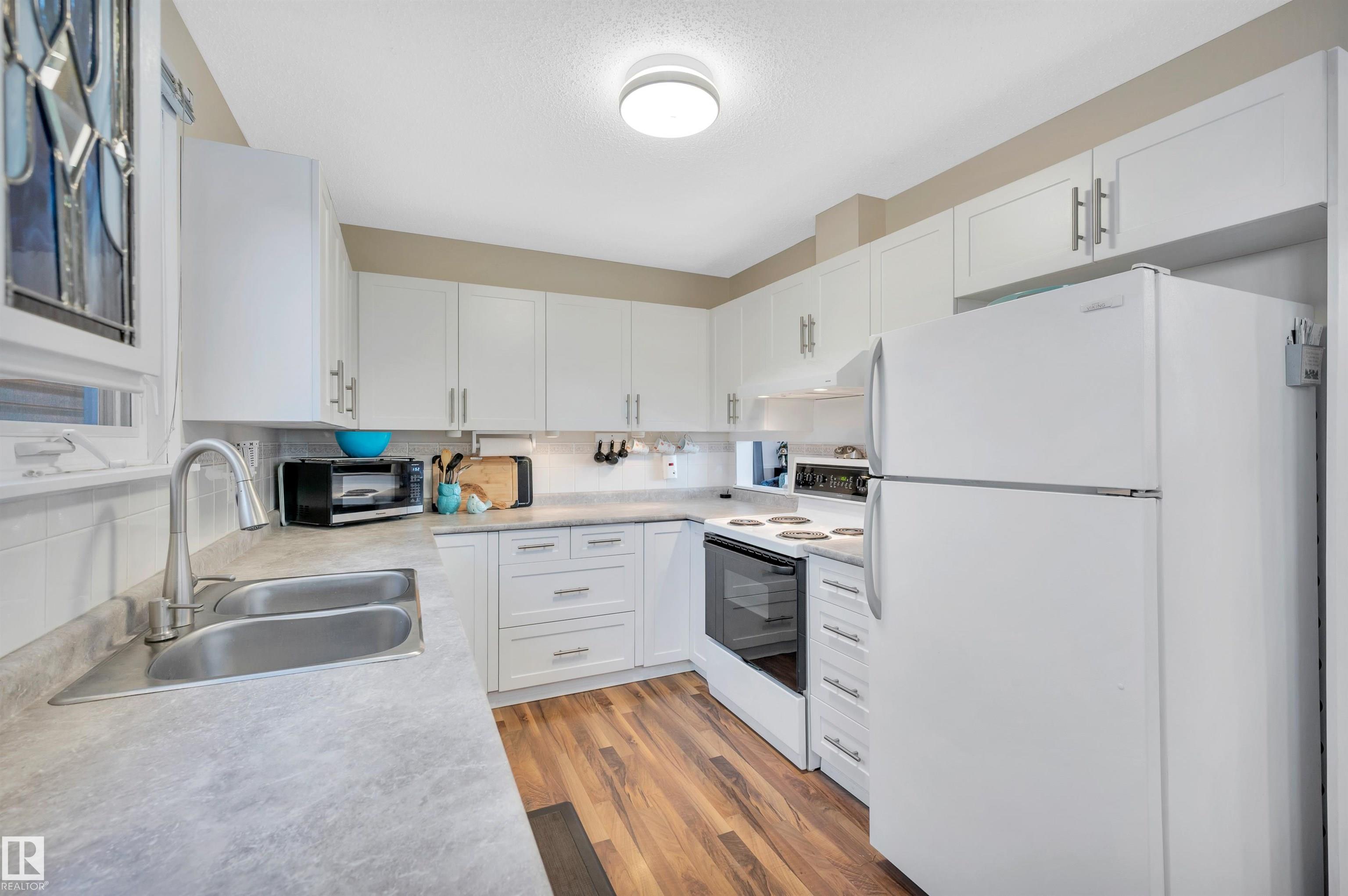 Photo 11 at 1412 35 Street NW, Crawford Plains, Edmonton