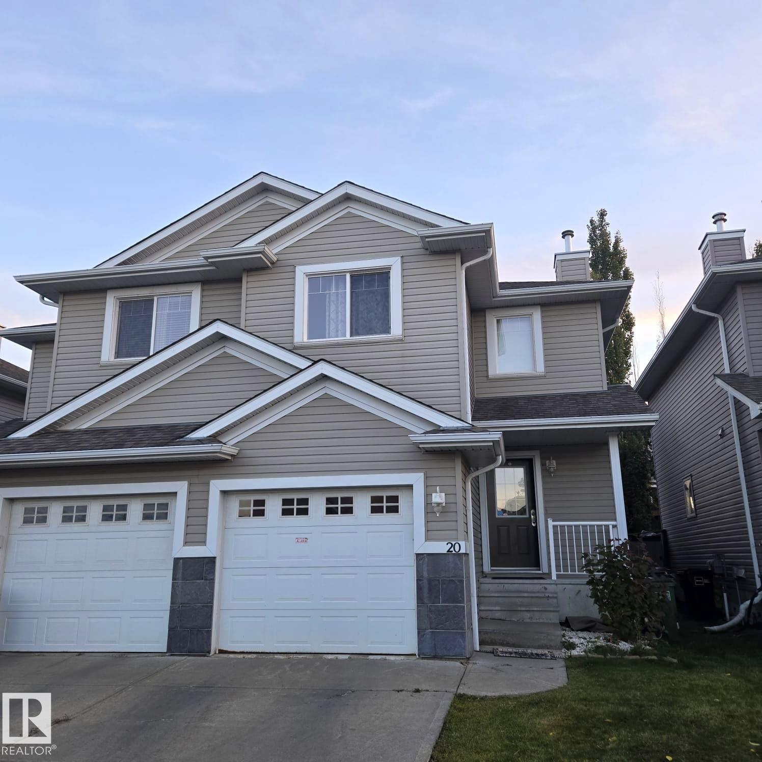 Welcome to this beautifully maintained 3-bedroom, 2.5-bathroom half duplex with an attached garage and fully finished basement in the desirable Magrath Heights community. The main level features generously sized living and dining areas with large windows and sliding glass doors that open to the deck and backyard, perfect for entertaining or relaxing with family. The upper level offers three bright, spacious bedrooms, including a master suite with a 3-piece en-suite and large walk-in closet. The finished basement provides additional living or recreational space. Conveniently located near Terwillegar Recreation Centre, Windermere Shopping Centre, walking paths, parks, schools, public transit, and major routes including Anthony Henday Drive and Whitemud Freeway, offering both city access and a peaceful neighborhood setting.