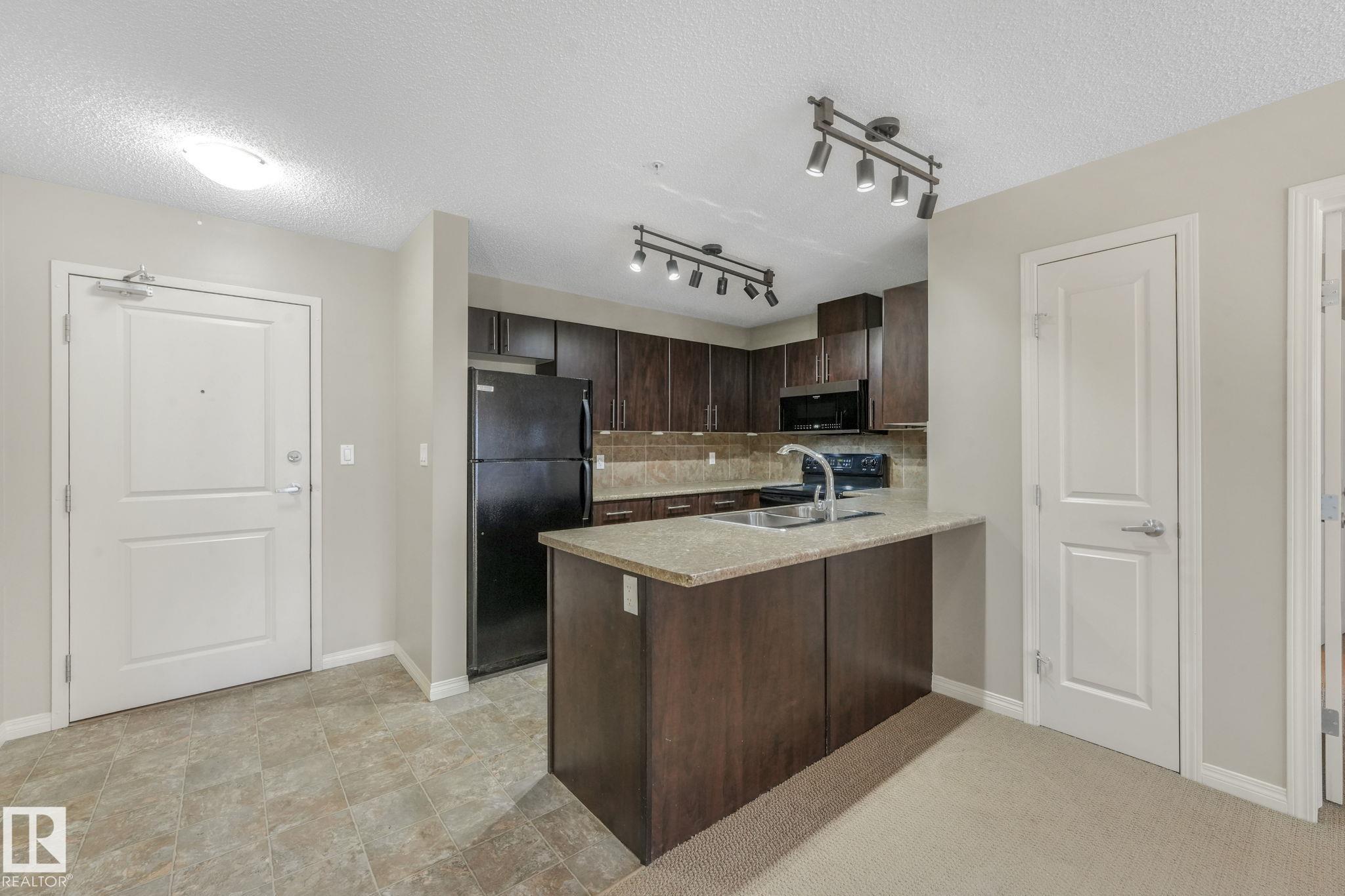 Picture for #210 103 AMBLESIDE DR SW