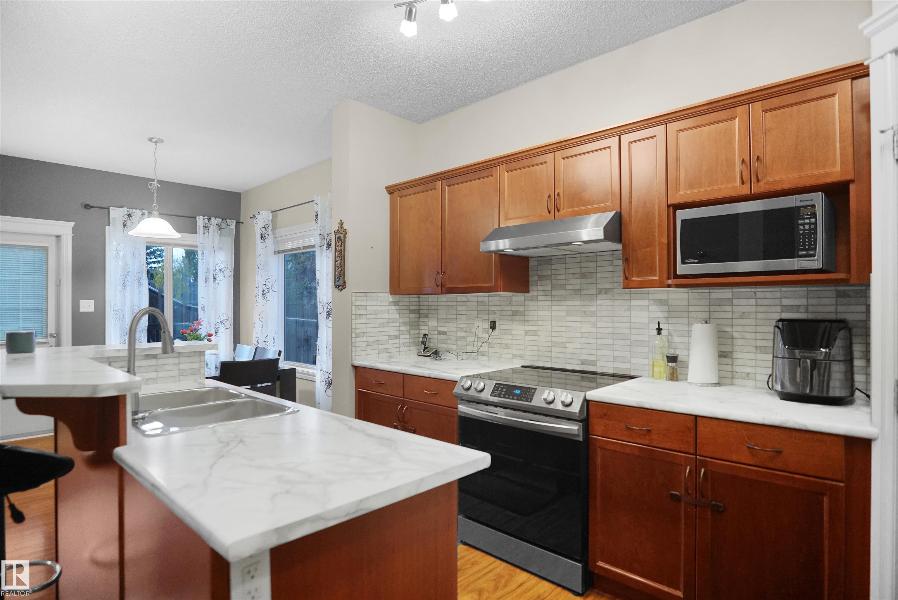 Photo 10 at 11409 13 Avenue SW, Rutherford, Edmonton