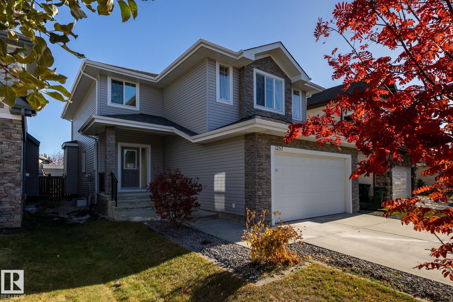 Welcome to this IMMACULATE and WELL APPOINTED 2-storey home perfectly located in a quiet crescent of a desirable family neighbourhood. Bright, spacious & open plan featuring a total of 3240 sq.ft. well designed living space. Gorgeous kitchen w/upgraded maple cabinetry & soft closing drawers, large island, granite counter top, walk through pantry,upgraded appliances & spacious dining nook w/ garden door to the deck. A large living room w/gas fireplace & view of rear yard. Upper floor has a huge bonus room, 2 large bedrooms, the primary bedroom has a spa like 5 pcs ensuite & walk in closet. Professionl finished basement has a huge rec room, large bedroom, full bath & a large storage room. Other features include new floorings ( carpet & hardwood), Paint,baseboard,chimmy hood fan, garden & pantry door ,9 ft. ceiling, main floor den & laundry, two plum trees & garden planter boxes in back yard and more. Perfect family home with easy access to all amenities.
