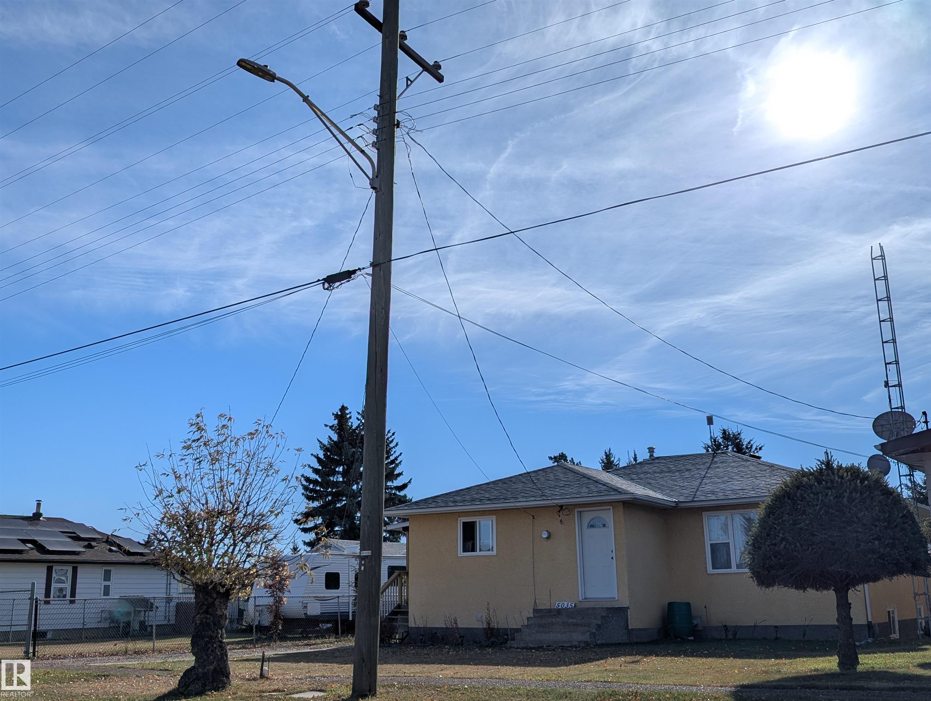 This vibrant yellow 3 bedroom bungalow has three beds upstairs along with 1- 4 piece, plus 1-3 piece bathroom and laundry area downstairs. Built solidly with character in 1956 this home has newer windows, shingles have been replaced and the back yard has plenty of space with apple tree and park like setting. Ample parking and storage.