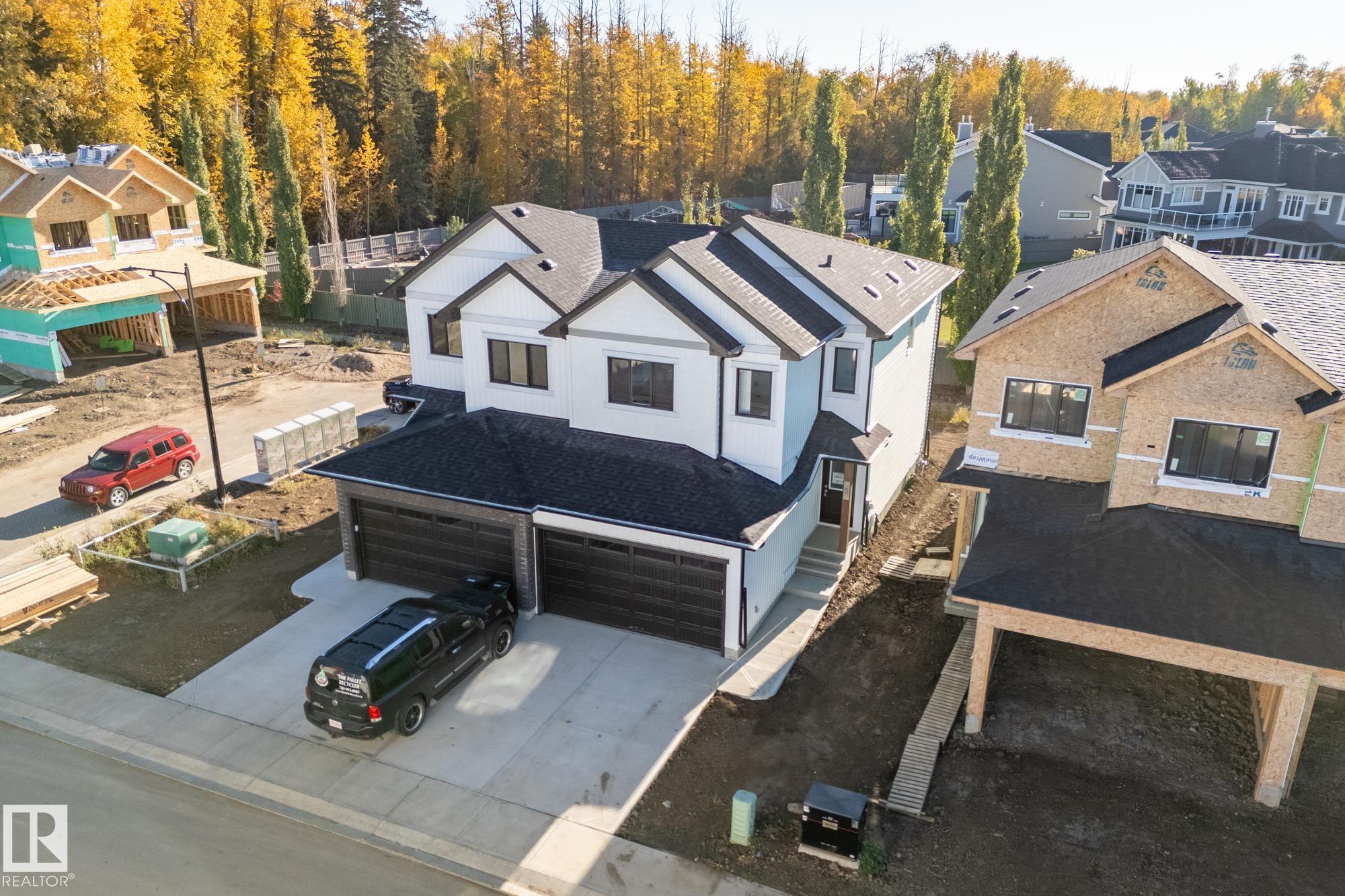 Introducing Copperwood Close by Ironstone Home Builders! Bordering lush forests to the North in The Grange District Park, Copperwood Close is a beautifully designed new community offering the best in parkside living.  Featuring a stunning modern farmhouse design, The Aspen model features 3 bedrooms, 2.5 baths, open concept main floor w/9ft ceilings, luxury vinyl plank flooring, a well equipped kitchen complete w/5 appliances & upgraded quartz counters, a bright great room open to the breakfast nook dinning area. The upper level features a tech area/loft space, large laundry room w/side by side washer & dryer, the primary bedroom comes with a generous sized walk-in closet & 3pc shower en-suite bath, 2 spacious bedrooms and 4pc bath. The home comes complete w/10 year AB New Home Warranty, fully landscaped, rear deck, double attached garage located on a prime lot backing onto a walkway. Don't miss out on this exclusive collection of expertly crafted & meticulously designed homes on the Park in The Hamptons.