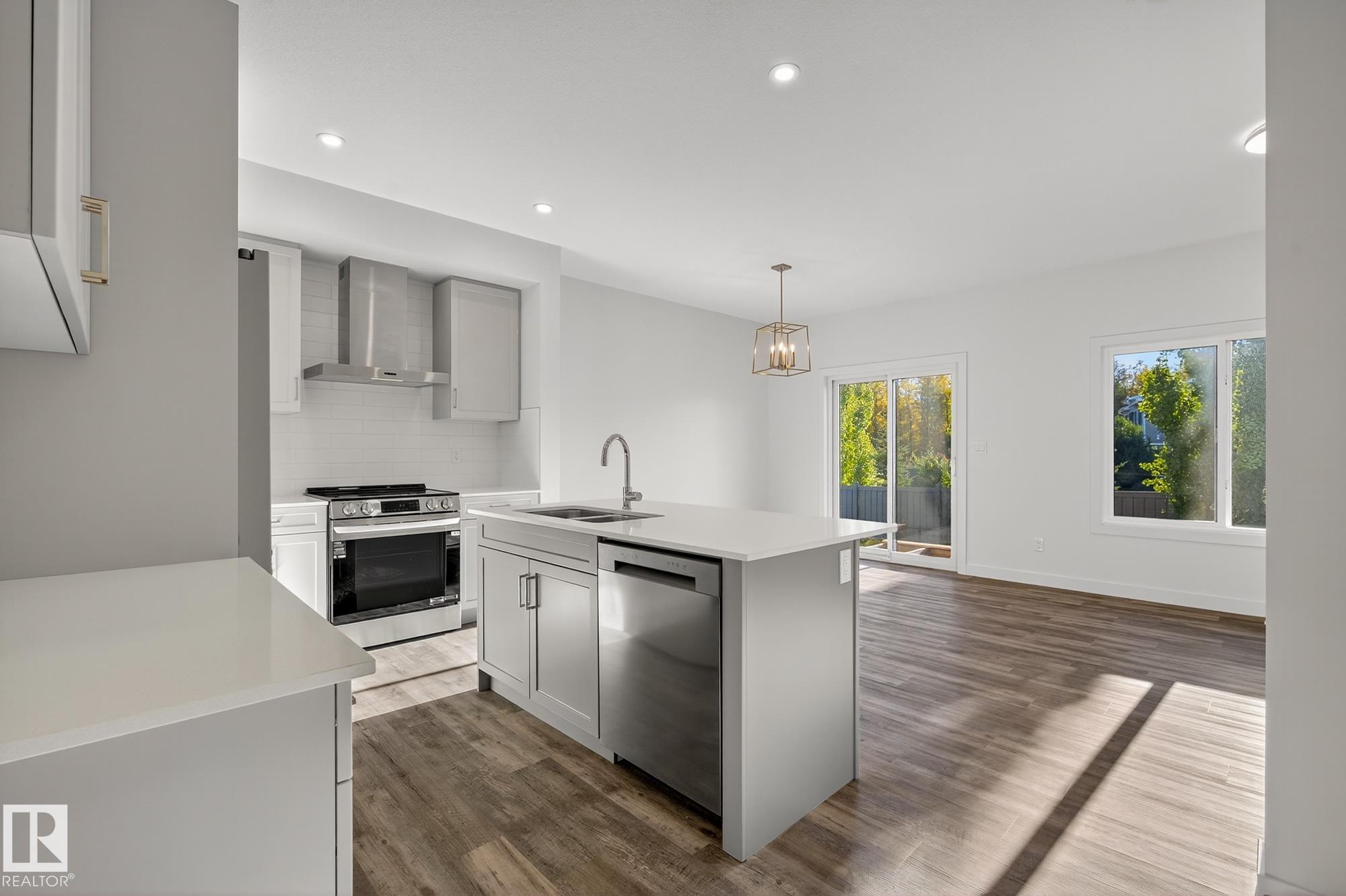 Photo 4 at 5 - 5122 213a Street NW, The Hamptons, Edmonton