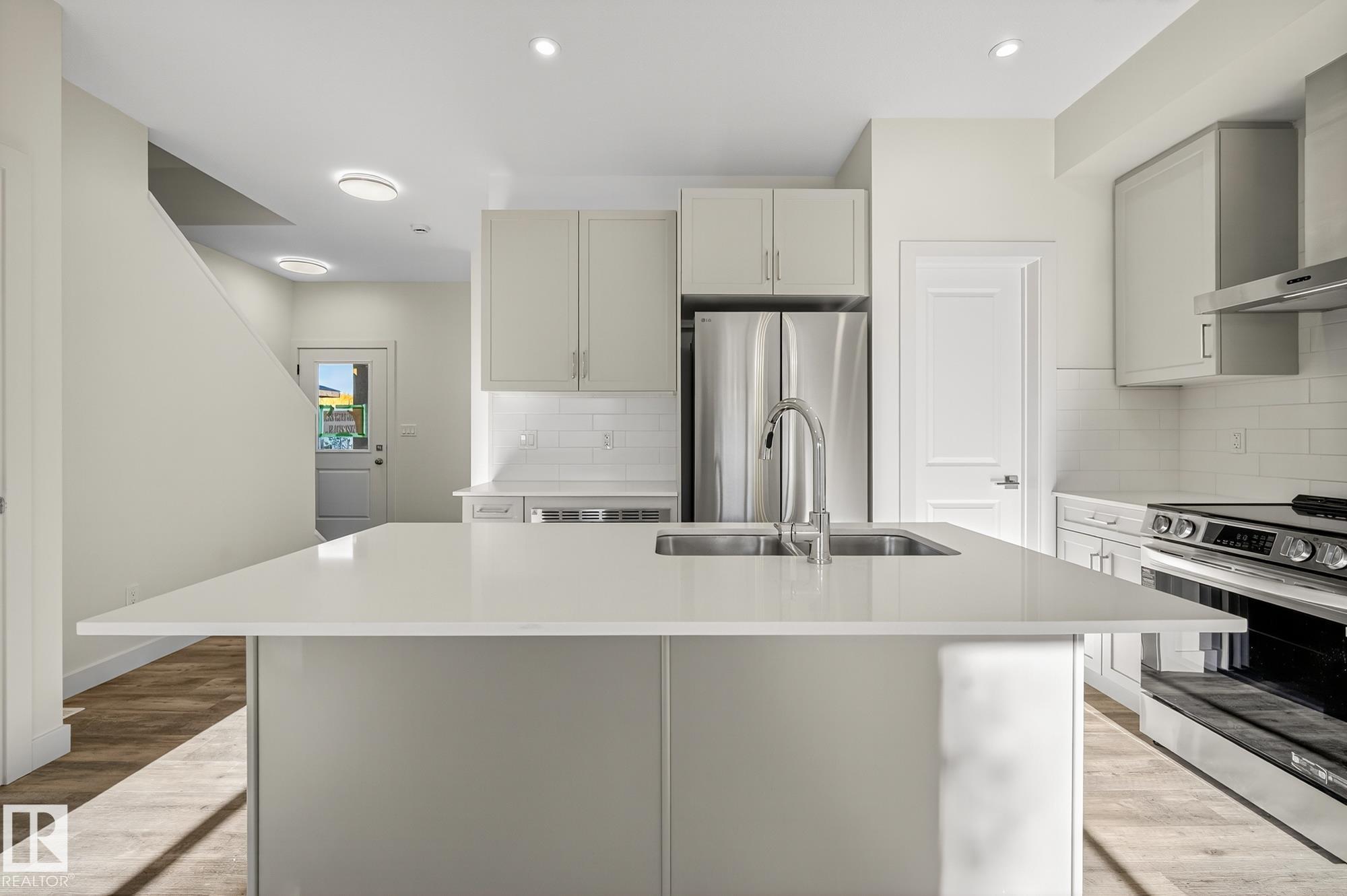 Photo 7 at 5 - 5122 213a Street NW, The Hamptons, Edmonton