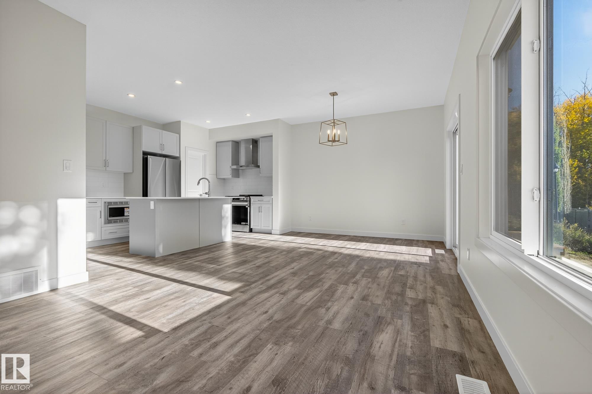 Photo 9 at 5 - 5122 213a Street NW, The Hamptons, Edmonton