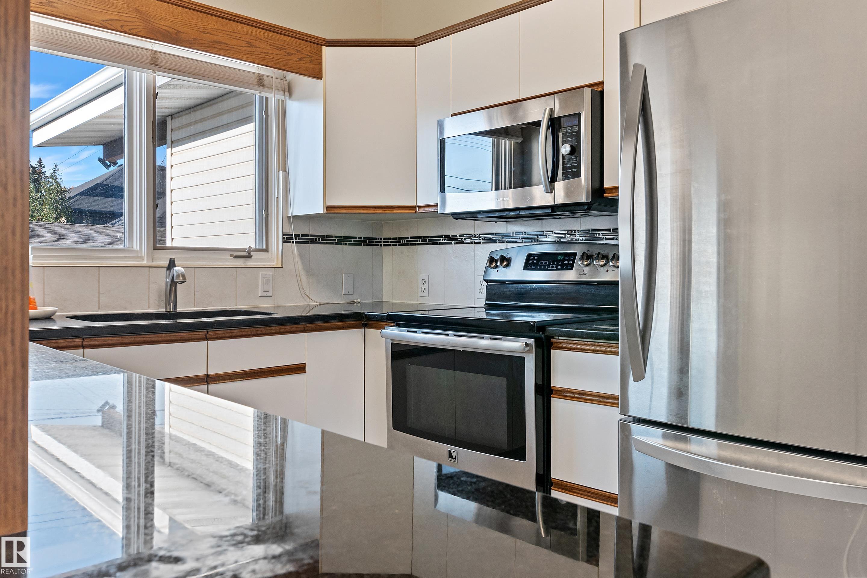 Photo 18 at 9708 64 Street NW, Ottewell, Edmonton